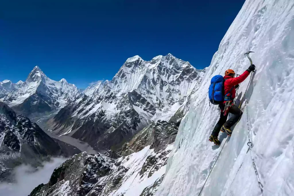 Climber ascending the steep ice wall headwall on Island Peak (Imja Tse) in Nepal with Nepal Footprint Holiday