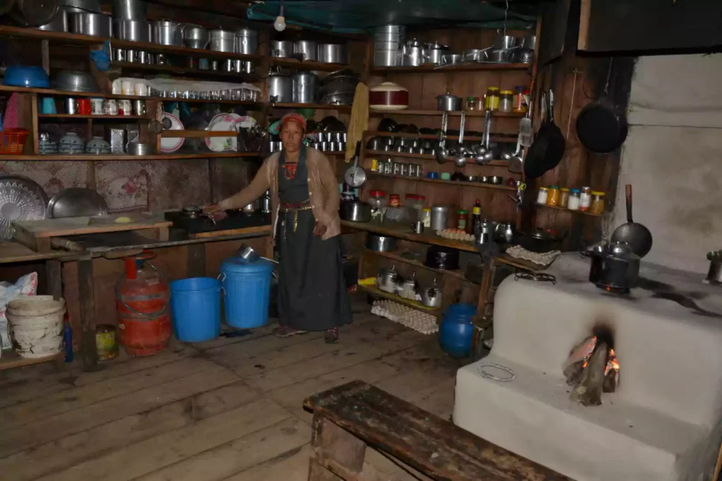 Traditional teahouse lodge interior serving hot meals to trekkers on the Annapurna Circuit Trek by Nepal Footprint Holiday