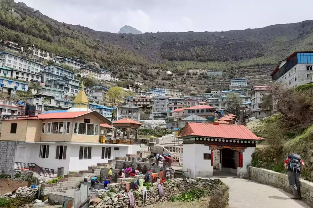 High-altitude mountain village in Nepal with teahouses and lodges along a trekking trail, illustrating why daily trekking costs increase at higher elevations – Nepal Footprint Holiday